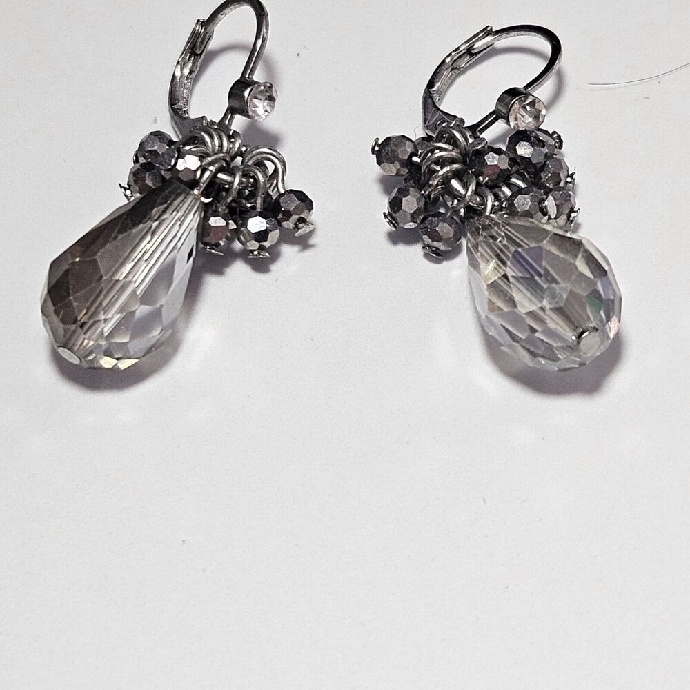 Silver tone dangling bead earrings